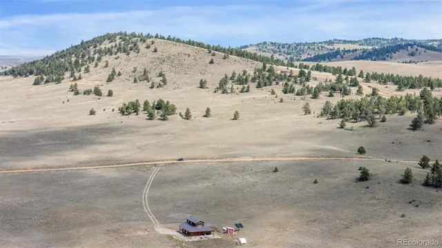a view of a beach with a snow on the road
