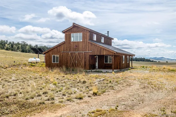 a house view with a garden space