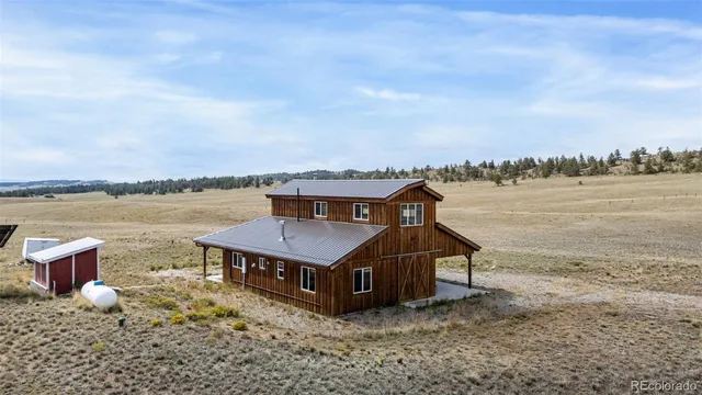 a aerial view of a house with a ocean view