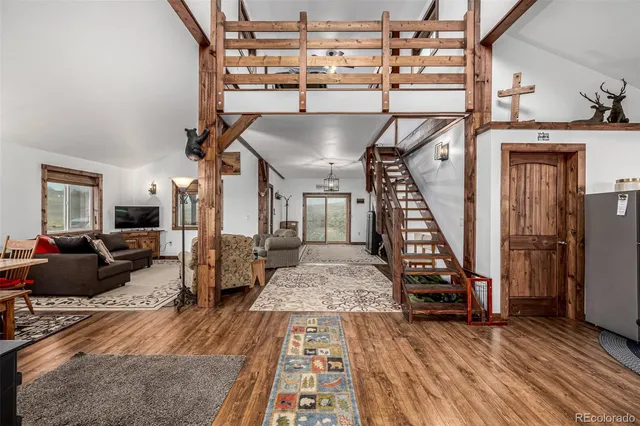 a very nice looking room with wooden floor