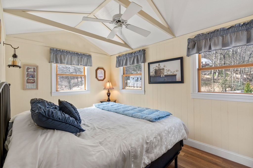 33 Pine Tree Drive Holland, MA 01521 - Photo 15 of 30 a bedroom with a large bed and a window