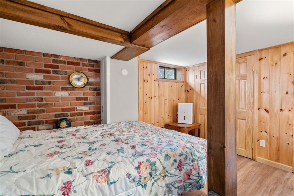 33 Pine Tree Drive Holland, MA 01521 - Photo 19 of 30 a bedroom with a bed and a dresser