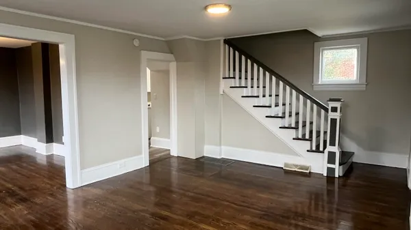 a view of entryway with wooden floor