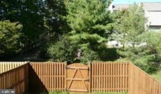 706 Summer Ridge Court Odenton, MD 21113 - Photo 28 of 53 Fully fenced back yard overlooking trees