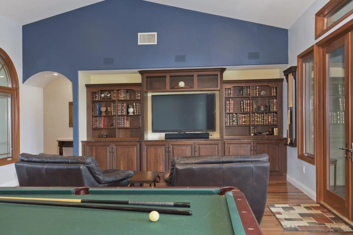 14401 Sandhill Road Poway, CA 92064 - Photo 11 of 75 a living room with furniture and a flat screen tv