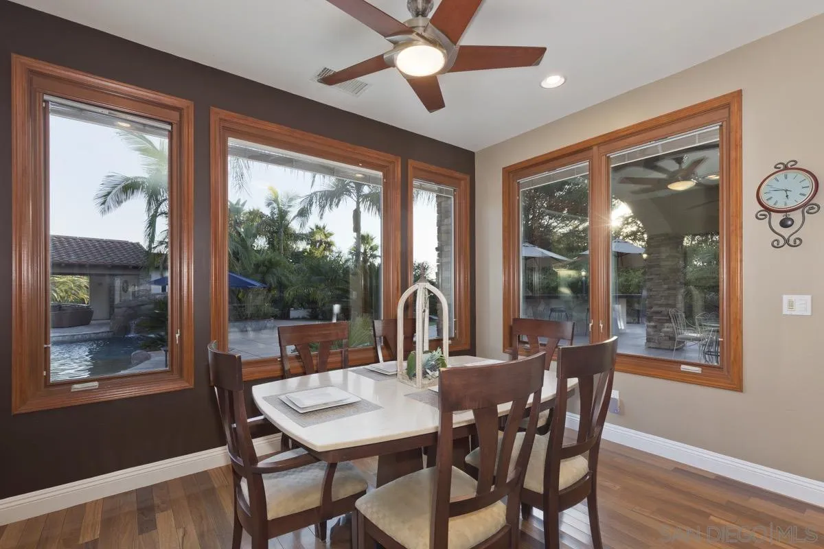 14401 Sandhill Road Poway, CA 92064 - Photo 19 of 75 a view of a dining room with furniture window and outside view
