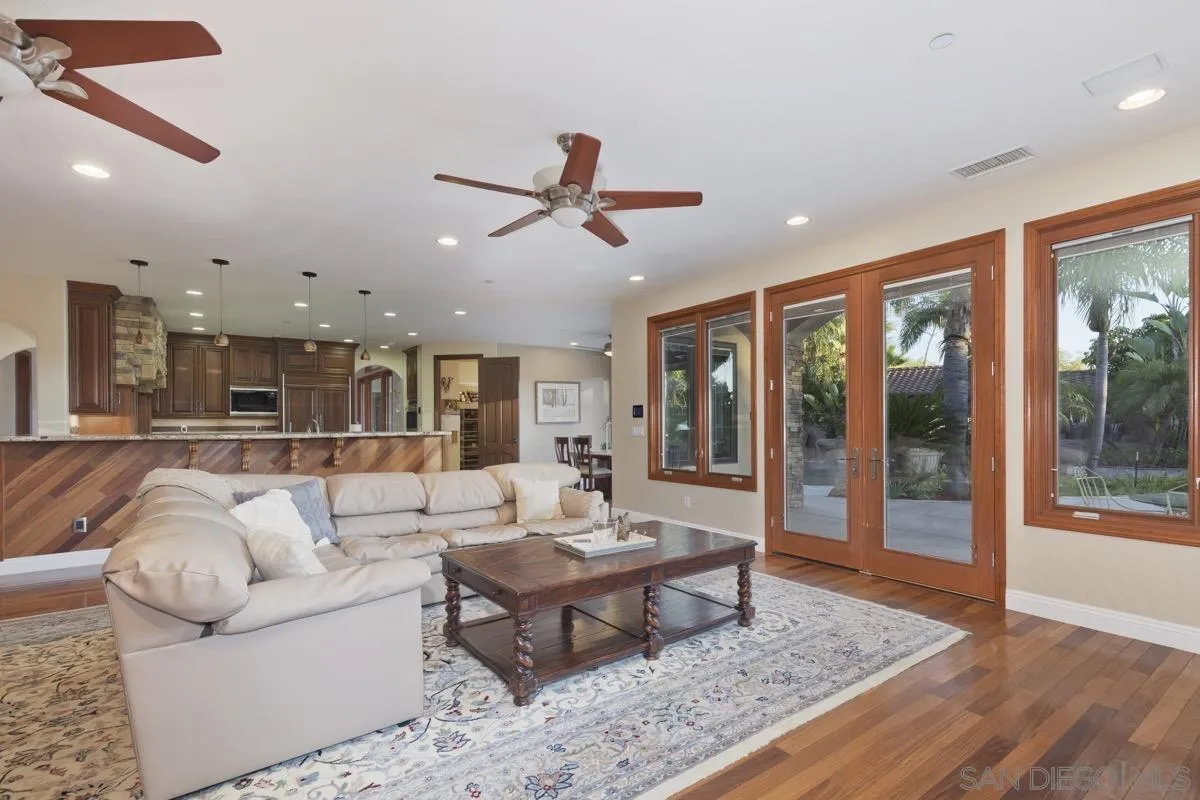 14401 Sandhill Road Poway, CA 92064 - Photo 20 of 75 a living room with furniture and a large window