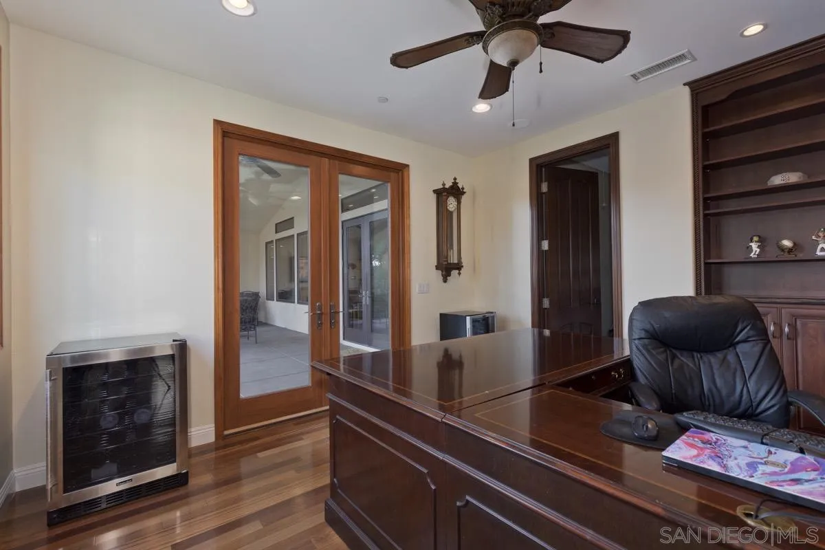 14401 Sandhill Road Poway, CA 92064 - Photo 29 of 75 a living room with furniture and a fireplace
