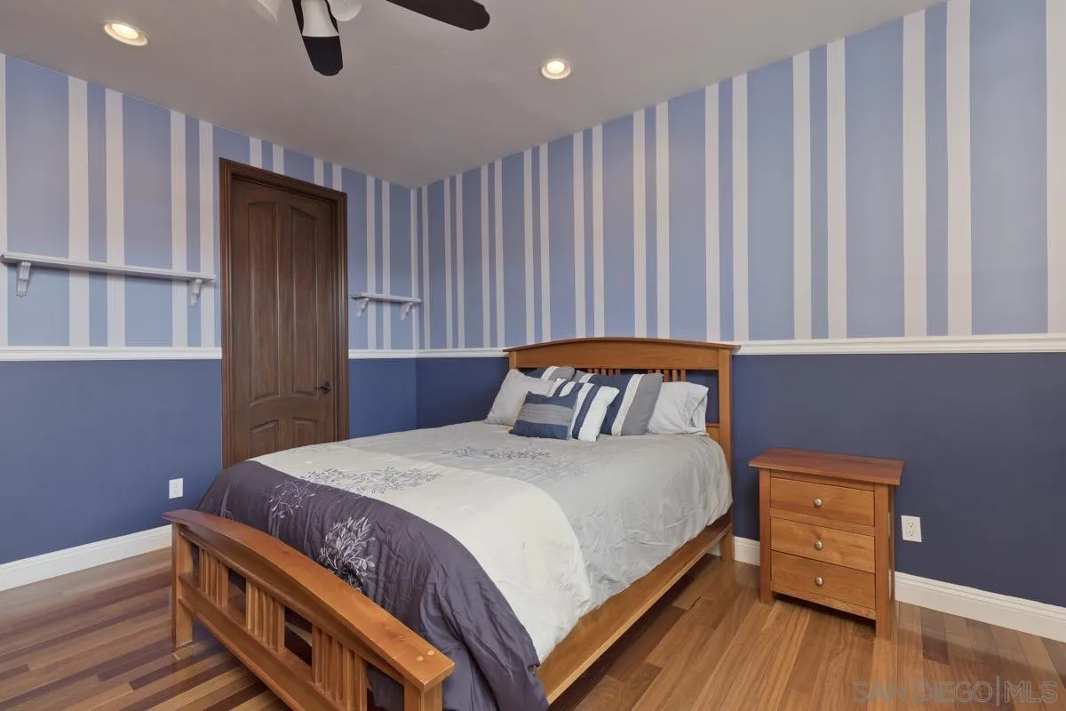 14401 Sandhill Road Poway, CA 92064 - Photo 40 of 75 a bedroom with a bed and a dresser