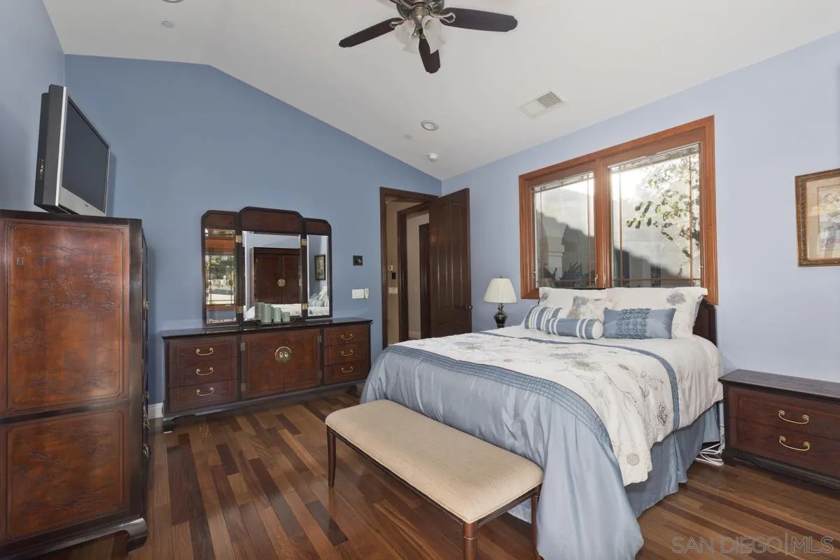 14401 Sandhill Road Poway, CA 92064 - Photo 44 of 75 a bedroom with a bed and a dresser