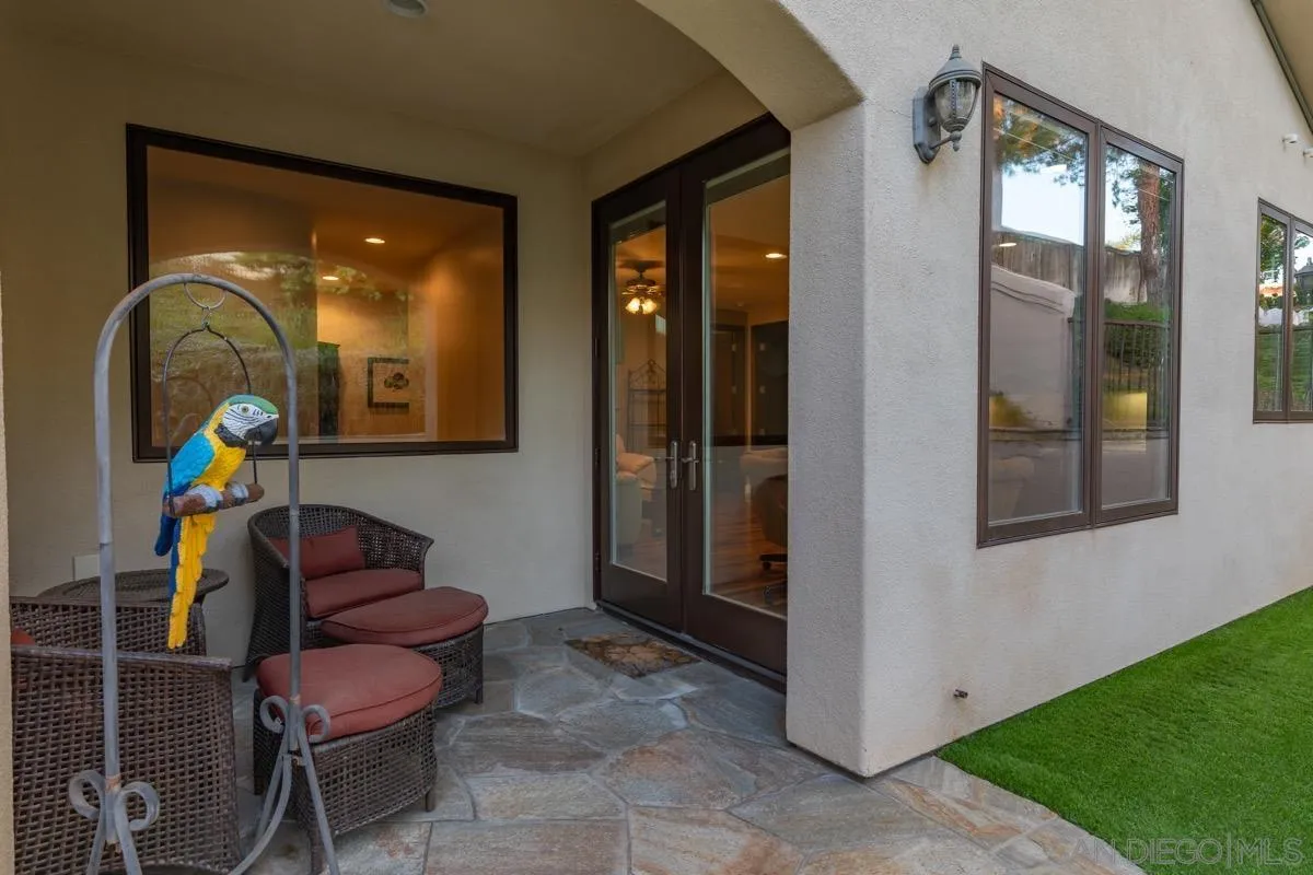 14401 Sandhill Road Poway, CA 92064 - Photo 46 of 75 a living room with furniture and a potted plant