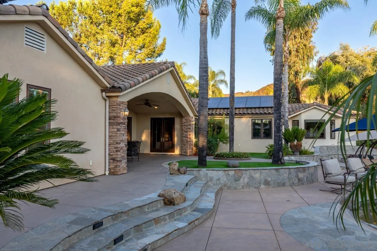 14401 Sandhill Road Poway, CA 92064 - Photo 49 of 75 a front view of a house with garden