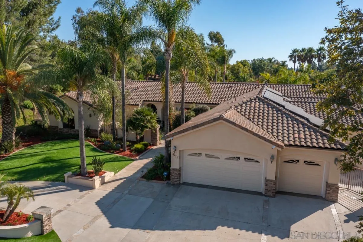 14401 Sandhill Road Poway, CA 92064 - Photo 6 of 75 a view of a house with a yard