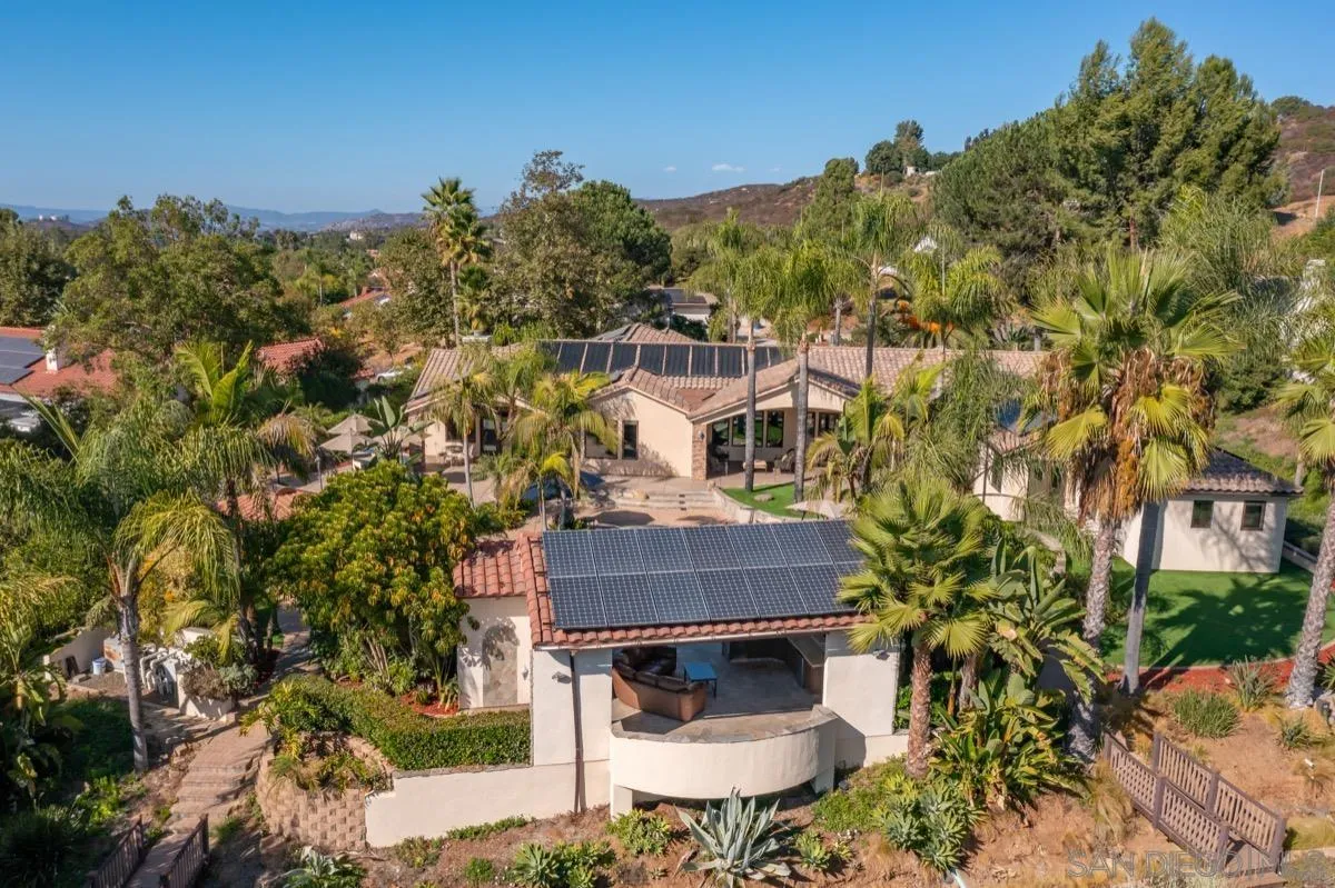 14401 Sandhill Road Poway, CA 92064 - Photo 63 of 75 a view of a house with a yard and sitting area