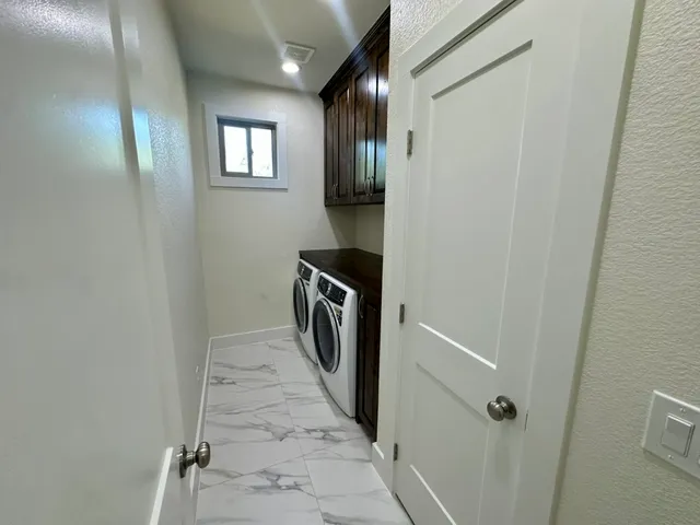 a view of a backyard of a house