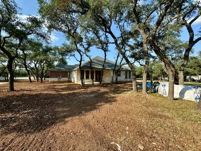 a view of outdoor space with deck and tree