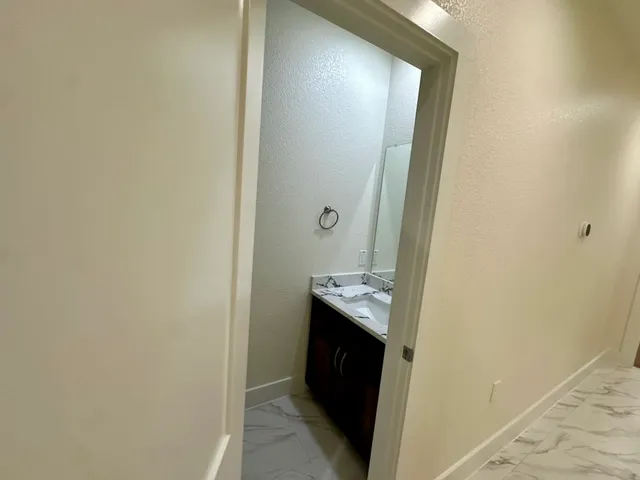 a view of bathroom with a sink