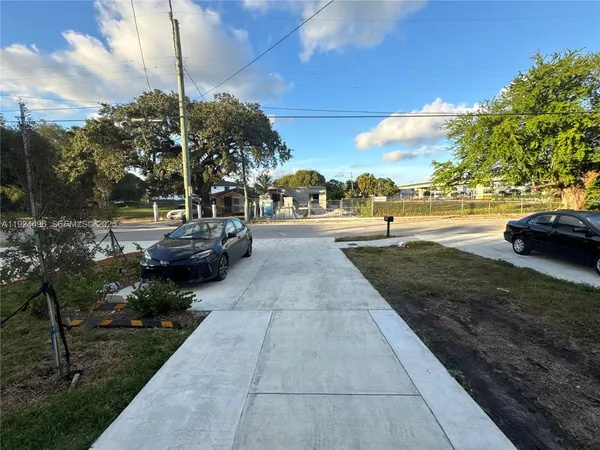 a view of a street with houses