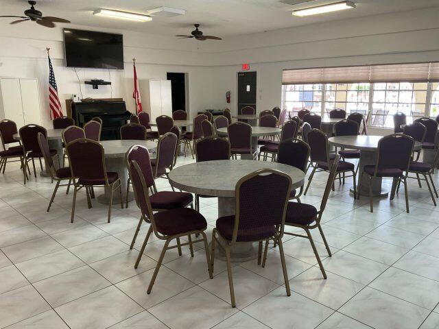5680 Southwest 3rd Place, Unit 206 Margate, FL 33068 - Photo 18 of 22 a view of a dining room with furniture