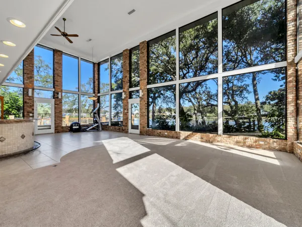a view of a hallway to a livingroom
