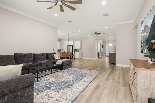 a bedroom with a bed and a flat screen television