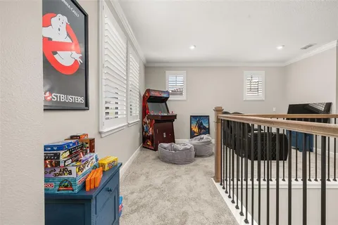 an aerial view of a house with a swimming pool