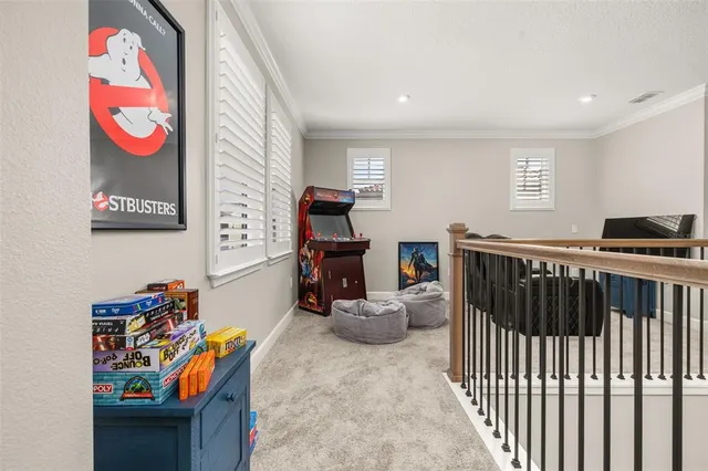 an aerial view of a house with a swimming pool