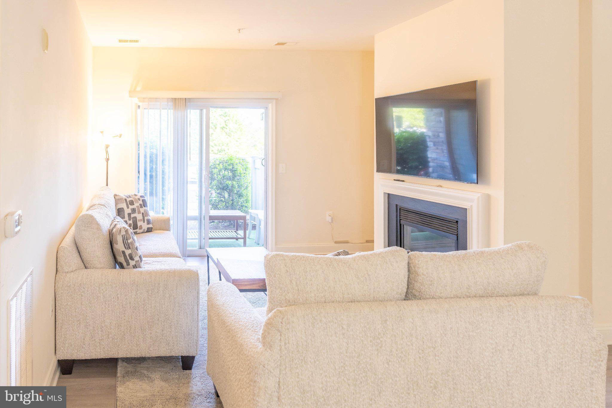 12824 Clarksburg Square Road, Unit 105 Clarksburg, MD 20871 - Photo 26 of 96 Bright and inviting living space.