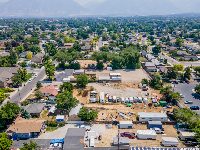 72 Cox Lane Midvale, UT 84047 - Photo 11 of 16 Expansive land parcel featuring a largely undeveloped surface and several outbuildings