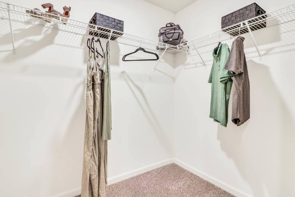 4201 High Point Court Joliet, IL 60421 - Photo 21 of 21 a view of walk in closet with clothes and shoes