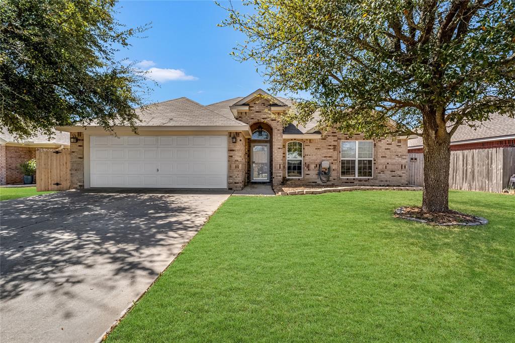 5209 Foxhill Road Temple, TX 76502 - Photo 2 of 14 a front view of house with yard and green space