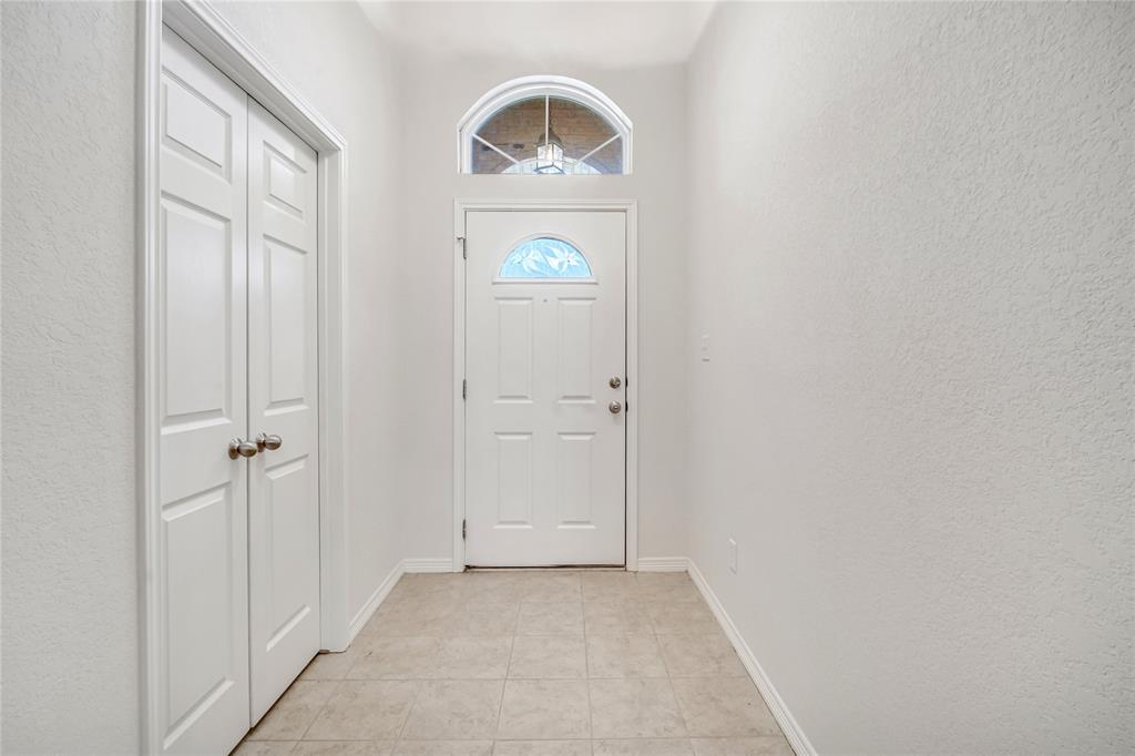 5209 Foxhill Road Temple, TX 76502 - Photo 4 of 14 an empty room with window wooden floor and windows