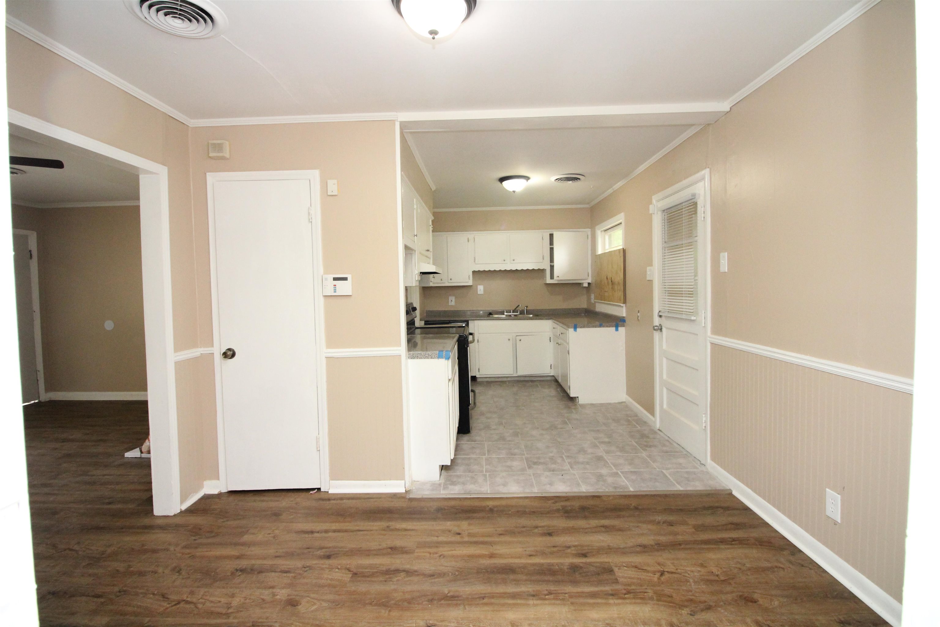 5281 Lochinvar Road Memphis, TN 38116 - Photo 8 of 22 a view of kitchen with wooden floor