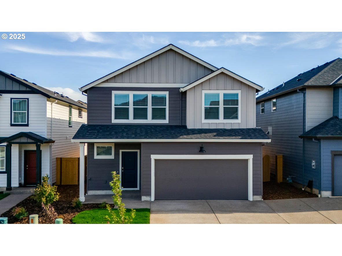 2987 U Street Springfield, OR 97477 - Photo 1 of 30 a front view of a house with garden