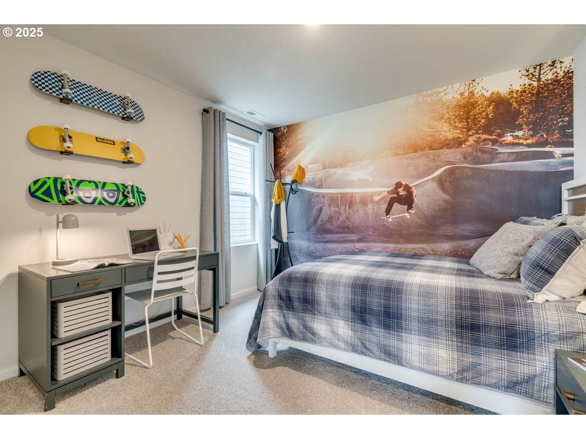 2987 U Street Springfield, OR 97477 - Photo 17 of 30 a bedroom with a bed and a desk