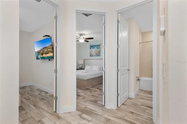 a bathroom with a tub and shower