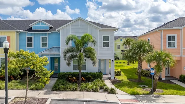 a view of multiple houses with a street