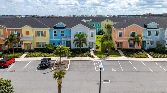 an aerial view of residential houses and outdoor space