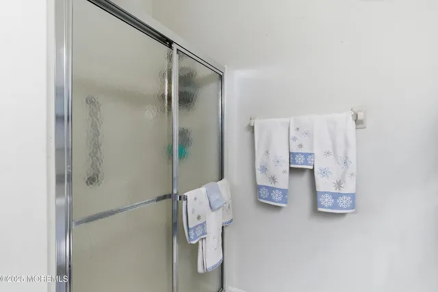 a view of a livingroom with furniture and stairs