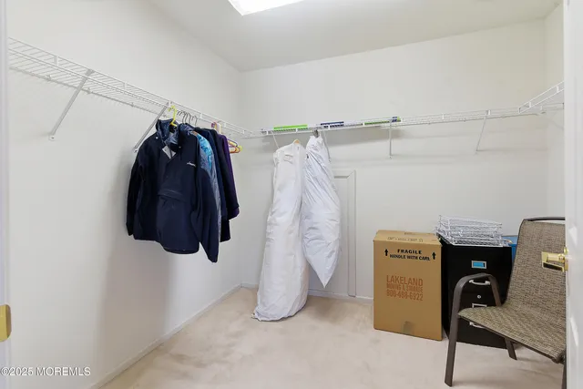a view of a house with a yard porch and sitting area