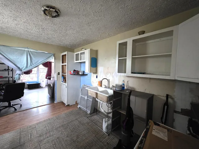 a workspace with furniture and window