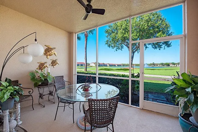 a table room with furniture and potted plant