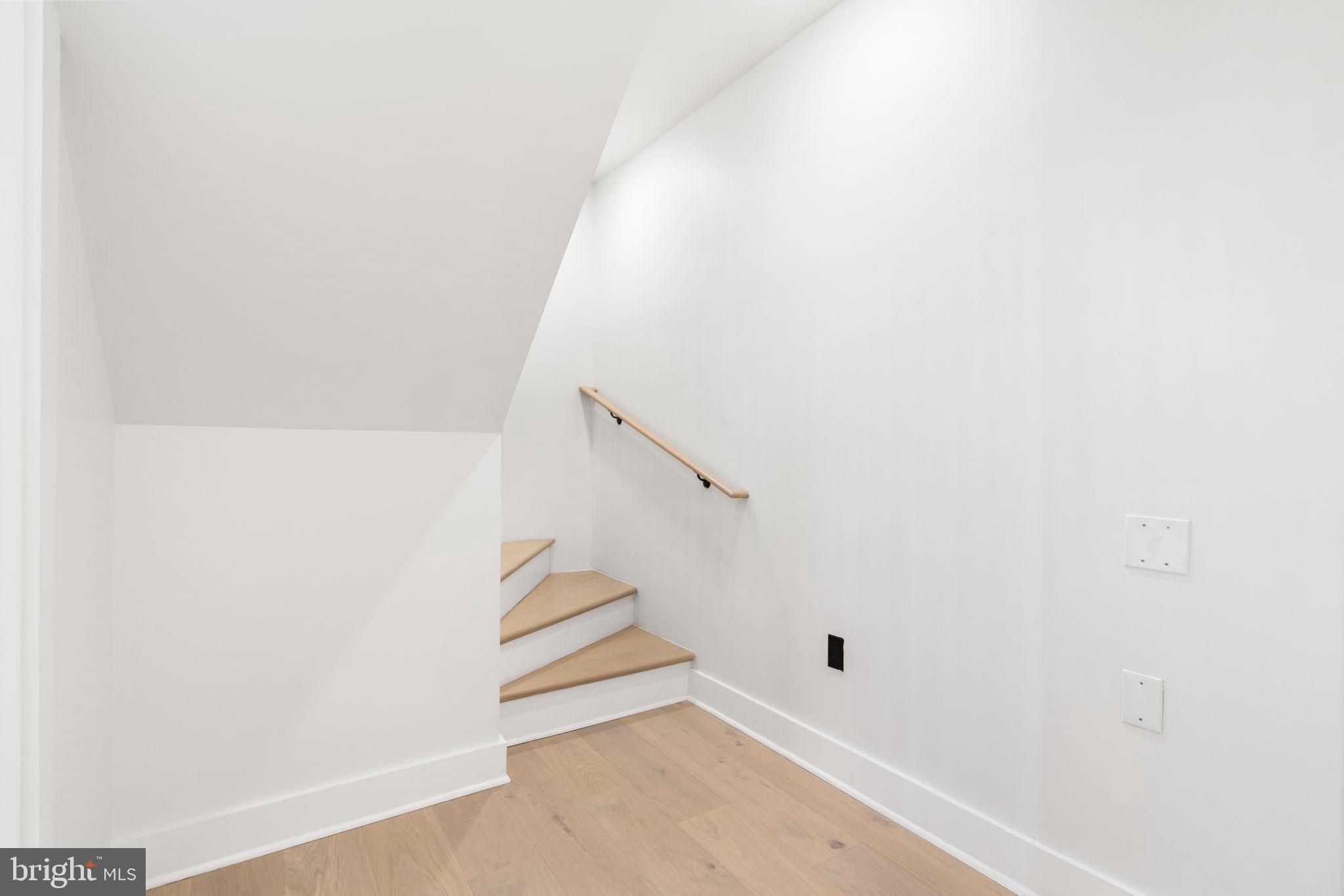 2504 41st Street Northwest, Unit 5 Washington, DC 20007 - Photo 16 of 24 a view of entryway with stairs