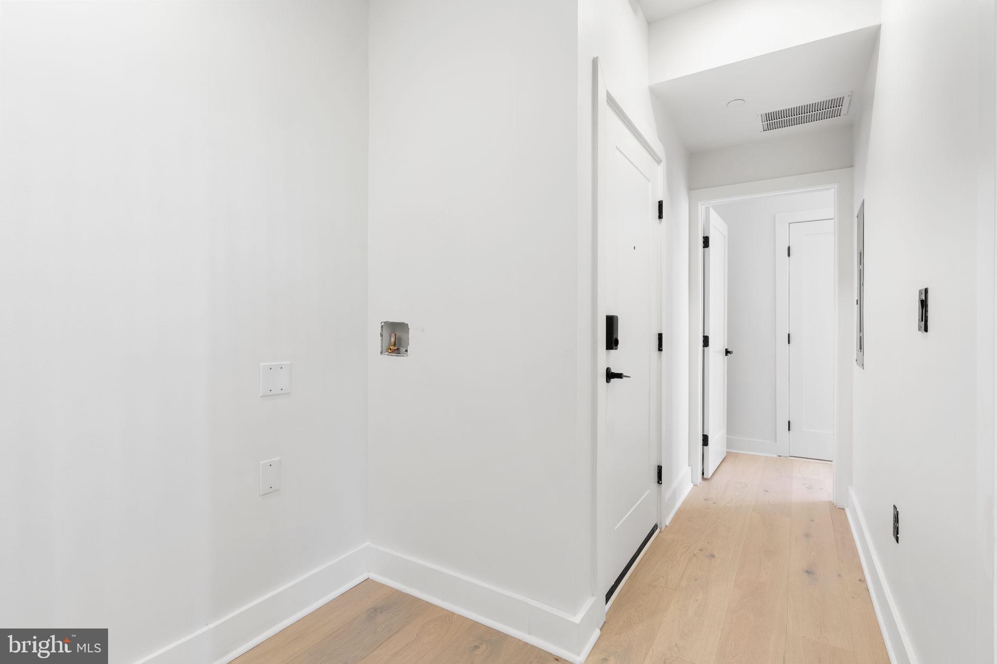 2504 41st Street Northwest, Unit 5 Washington, DC 20007 - Photo 17 of 24 a view of a hallway with wooden floor