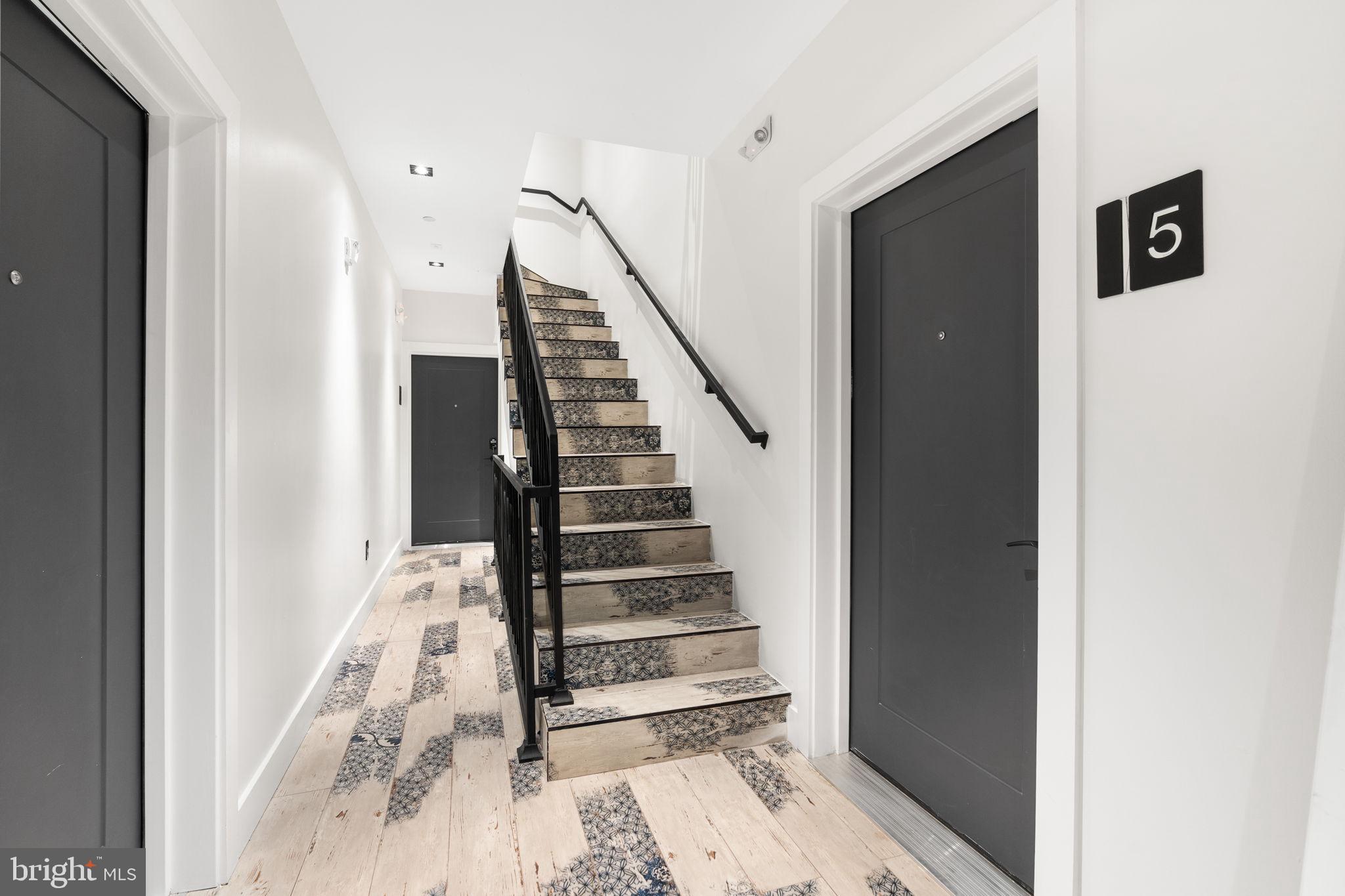 2504 41st Street Northwest, Unit 5 Washington, DC 20007 - Photo 4 of 24 a view of a hallway with wooden floor and entryway