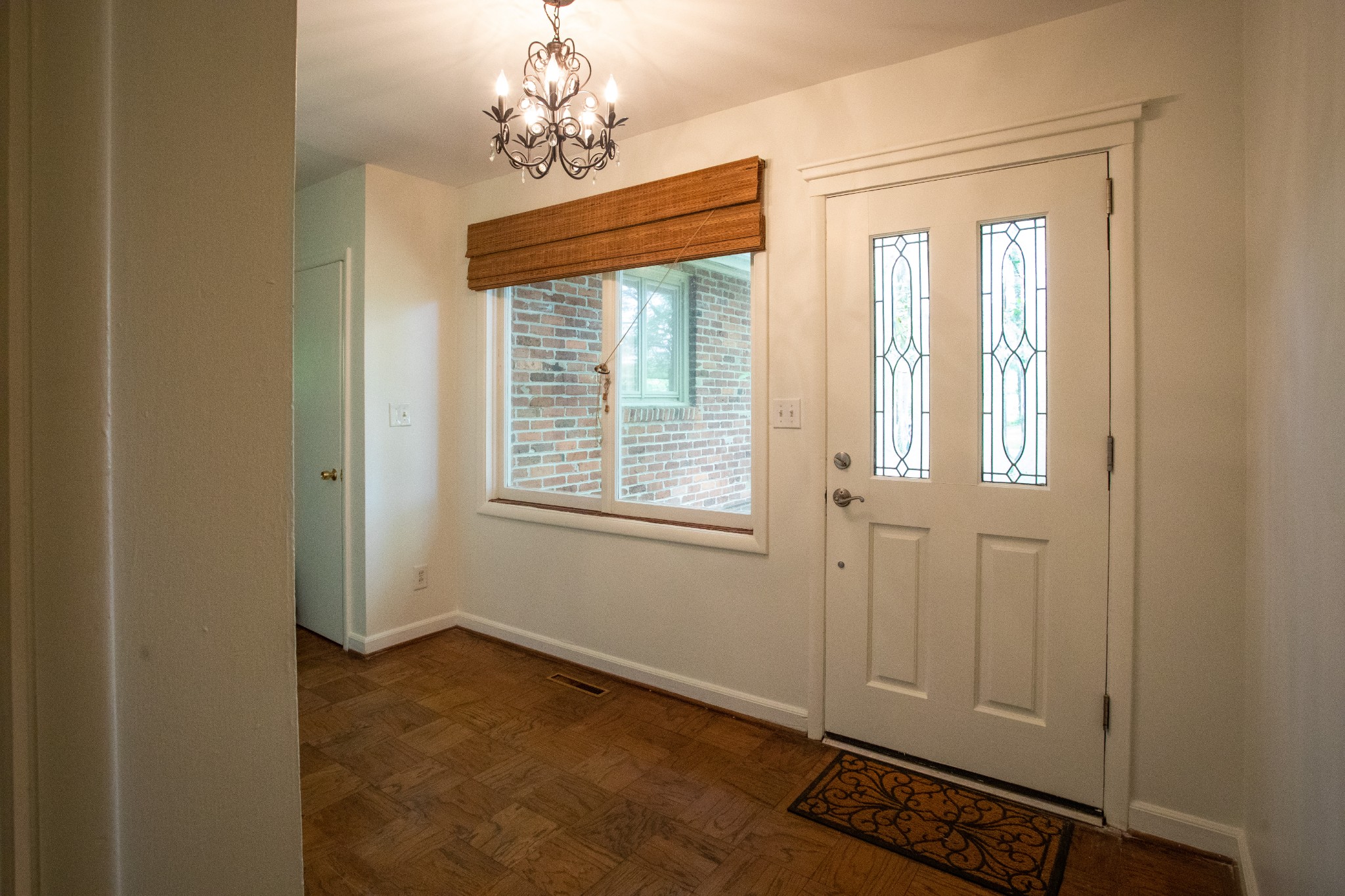283 Green's View Road Sewanee, TN 37375 - Photo 13 of 50 a view of a chandelier fan and wooden floor