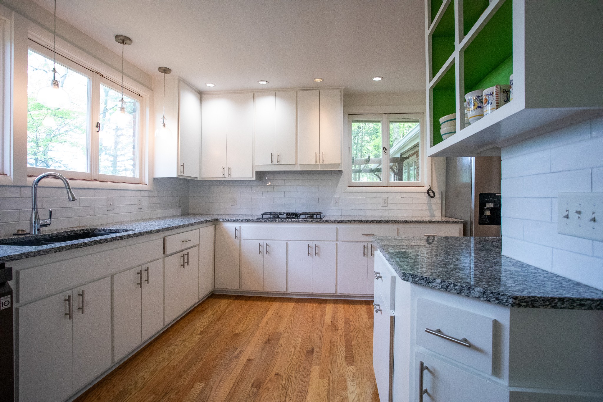 283 Green's View Road Sewanee, TN 37375 - Photo 18 of 50 a kitchen with stainless steel appliances granite countertop a sink a stove and cabinets