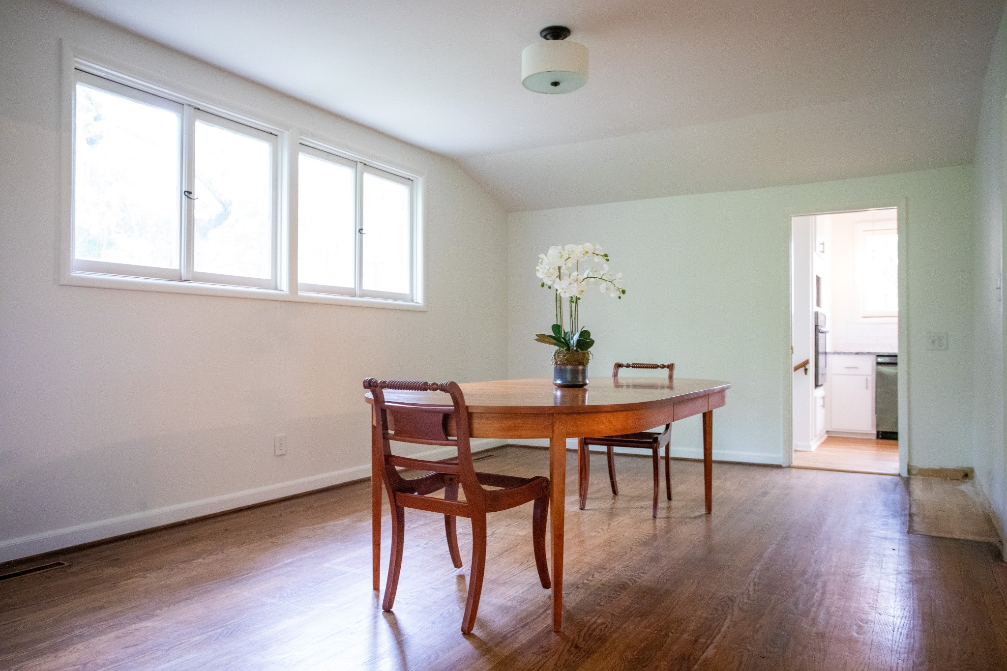 283 Green's View Road Sewanee, TN 37375 - Photo 22 of 50 a view of a dining room with furniture and wooden floor