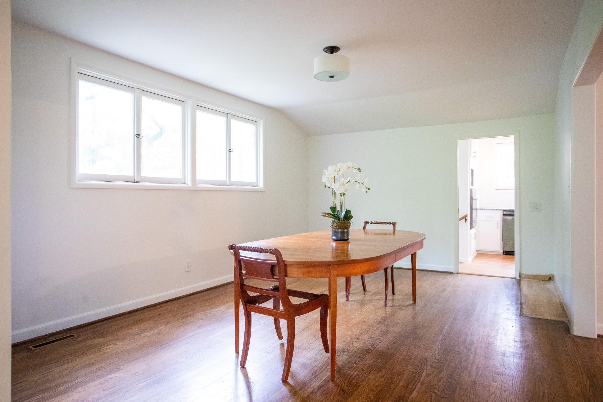 283 Green's View Road Sewanee, TN 37375 - Photo 23 of 50 a view of a dining room with furniture and wooden floor