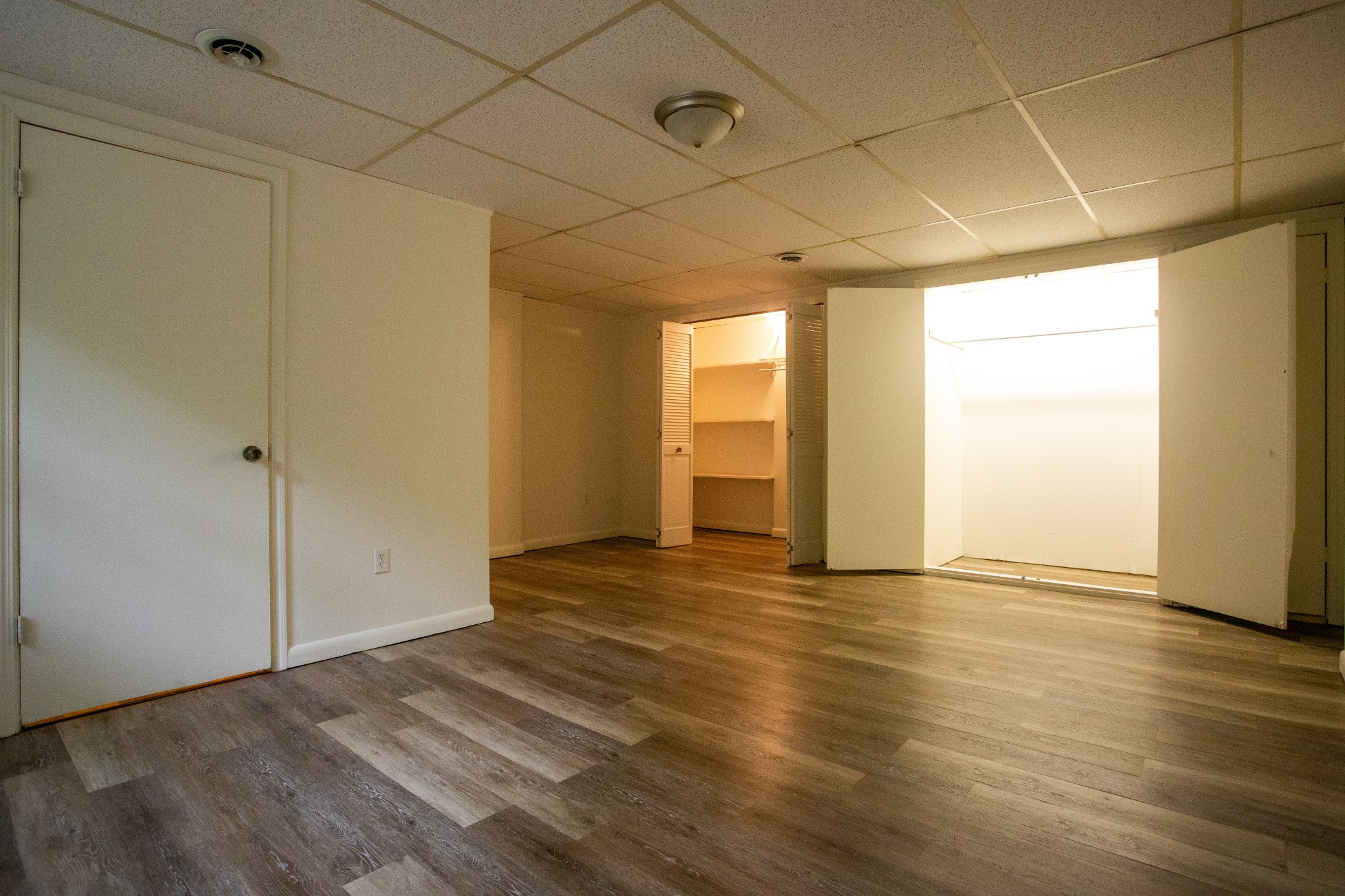 283 Green's View Road Sewanee, TN 37375 - Photo 42 of 50 a view of an empty room with wooden floor and a window